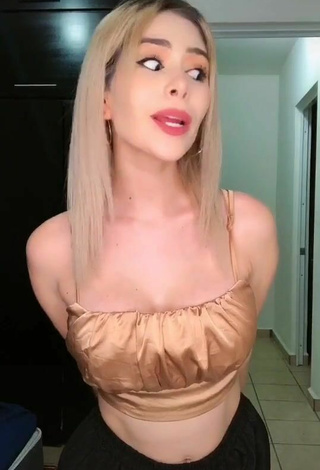 2. Beautiful Mafer Payan Shows Cleavage in Sexy Golden Crop Top