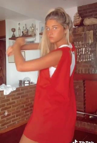 4. Sexy Maga Seggio Shows Cleavage in Red Dress
