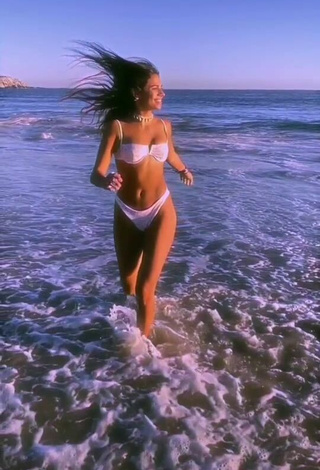 4. Hottest Manu Barrios Shows Cleavage in White Bikini in the Sea