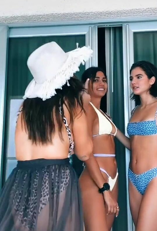 2. Magnetic Manu Barrios Shows Cleavage in Appealing White Bikini