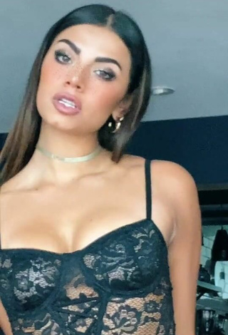 2. Sexy Manu Barrios Shows Cleavage in Black Bodysuit