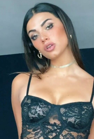 3. Sexy Manu Barrios Shows Cleavage in Black Bodysuit