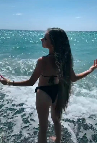 2. Hot Maria Iliukhina in Black Bikini in the Sea at the Beach
