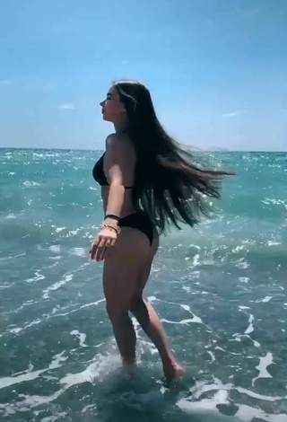 5. Hot Maria Iliukhina in Black Bikini in the Sea at the Beach