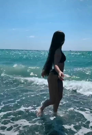 6. Hot Maria Iliukhina in Black Bikini in the Sea at the Beach