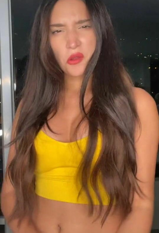 3. Sweetie Mariam Obregón Shows Cleavage in Yellow Crop Top