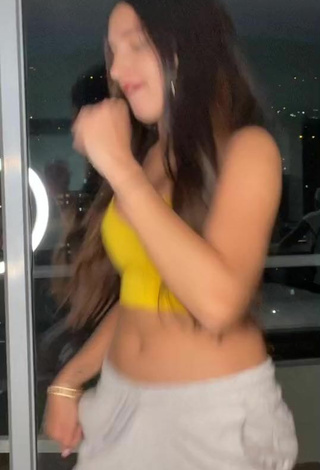 6. Sweetie Mariam Obregón Shows Cleavage in Yellow Crop Top
