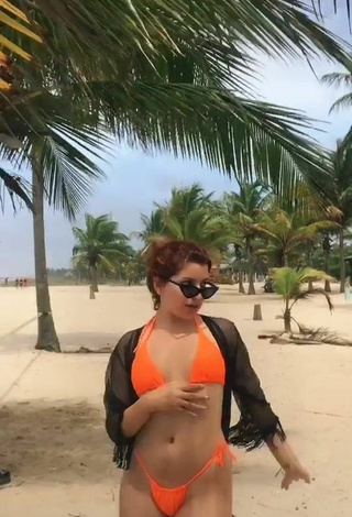 3. Sexy Marian in Orange Bikini at the Beach