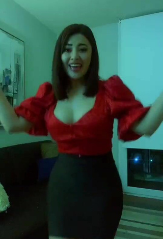 3. Hottie Milagro Flores Shows Cleavage in Red Top