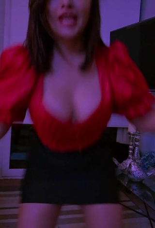 2. Cute Milagro Flores Shows Cleavage in Red Crop Top
