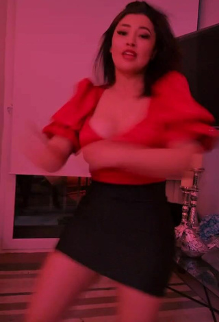 6. Cute Milagro Flores Shows Cleavage in Red Crop Top