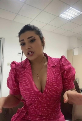 2. Sweetie Milagro Flores Shows Cleavage in Pink Dress