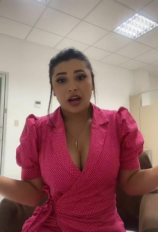 3. Sweetie Milagro Flores Shows Cleavage in Pink Dress