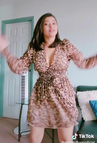6. Hot Milagro Flores Shows Cleavage in Leopard Dress and Bouncing Breasts