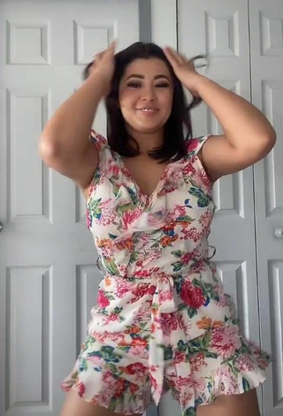 2. Hot Milagro Flores Shows Cleavage in Floral Overall