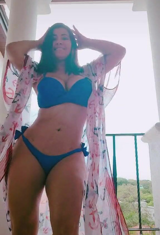 4. Sexy Milagro Flores Shows Cleavage in Black Bikini
