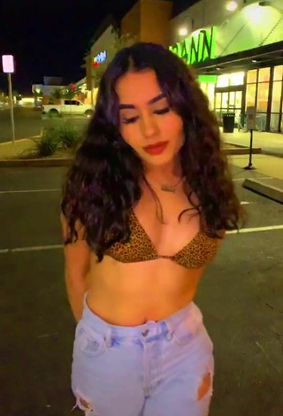 Sexy Iya Madrid Shows Cleavage in Leopard Bikini Top