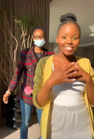Hot mpho pink Shows Cleavage in White Top
