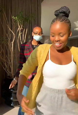4. Hot mpho pink Shows Cleavage in White Top