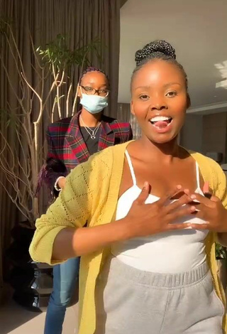 5. Hot mpho pink Shows Cleavage in White Top