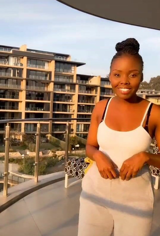 3. Sexy mpho pink Shows Cleavage in White Top