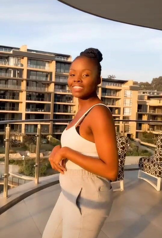 5. Sexy mpho pink Shows Cleavage in White Top