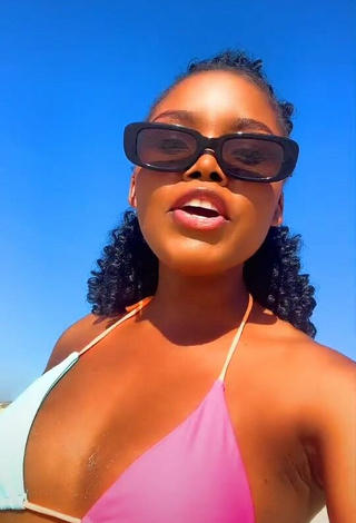 Hot mpho pink Shows Cleavage in Bikini Top at the Beach