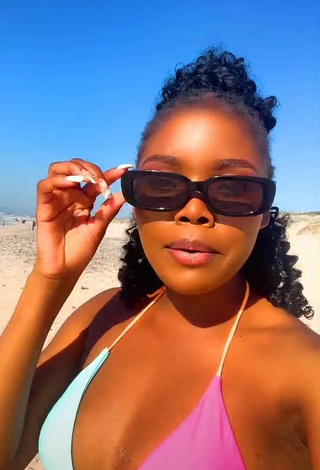 2. Hot mpho pink Shows Cleavage in Bikini Top at the Beach