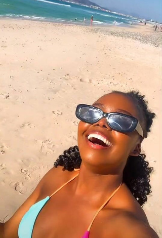 6. Hot mpho pink Shows Cleavage in Bikini Top at the Beach