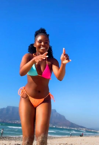4. Hot mpho pink Shows Cleavage in Bikini at the Beach