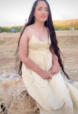 Sexy Mutlu Kaya Shows Cleavage in Sundress