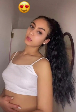 Sexy Najwa Shows Cleavage in White Crop Top
