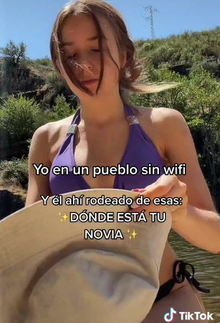 5. Sexy Natalia Jiménez Shows Cleavage in Purple Bikini Top