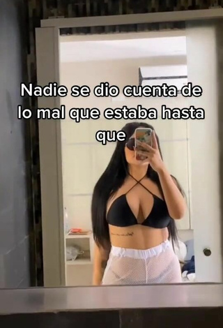 2. Sexy Nicole Diaz Shows Cleavage in Black Bikini Top