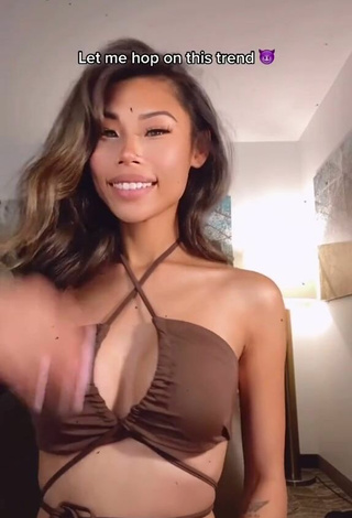 1. Sexy Nhu Tran Shows Cleavage in Brown Bikini Top