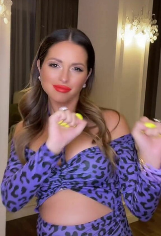 2. Sexy Nyusha Shows Cleavage in Leopard Dress