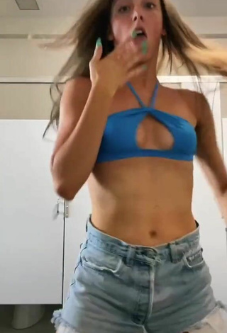 6. Sexy Olivia Alboher Shows Cleavage in Blue Bikini Top