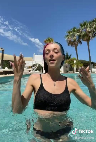 3. Sexy orane.rchd Shows Cleavage in Black Bikini Top at the Swimming Pool