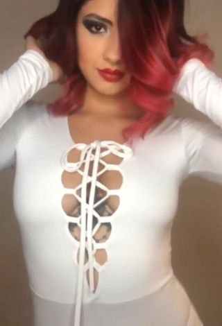 3. Sexy Paulina Usuga Shows Cleavage in White Bodysuit