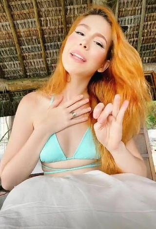3. Sexy Priscila Caliari Shows Cleavage in Turquoise Bikini Top