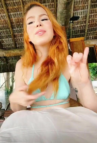 4. Sexy Priscila Caliari Shows Cleavage in Turquoise Bikini Top