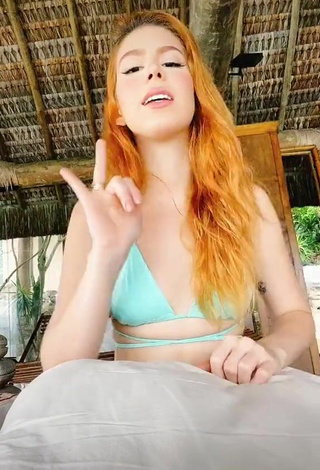 6. Sexy Priscila Caliari Shows Cleavage in Turquoise Bikini Top