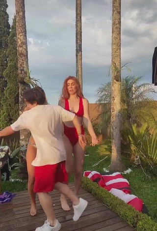 2. Seductive Priscila Caliari Shows Cleavage in Red Bikini