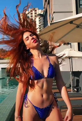 Beautiful Priscila Caliari Shows Cleavage in Sexy Blue Bikini