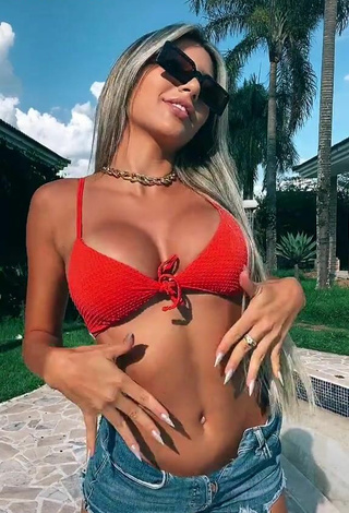 Erotic Raffaela Souza Shows Cleavage in Orange Bikini Top