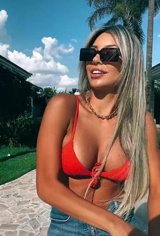6. Erotic Raffaela Souza Shows Cleavage in Orange Bikini Top