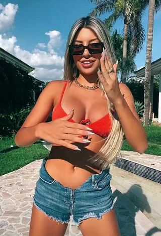 3. Amazing Raffaela Souza Shows Cleavage in Hot Orange Bikini Top