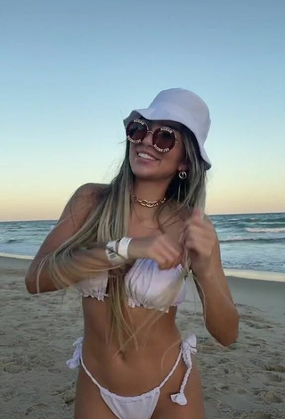 2. Cute Raffaela Souza Shows Cleavage in White Bikini at the Beach