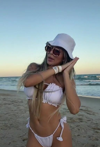 3. Cute Raffaela Souza Shows Cleavage in White Bikini at the Beach