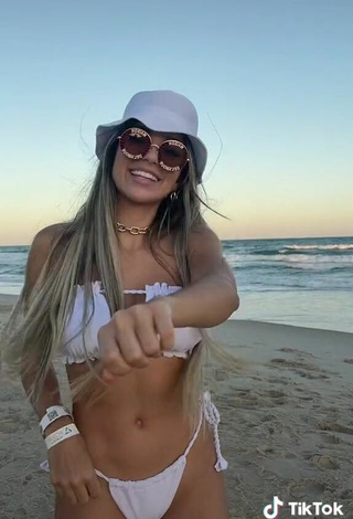6. Cute Raffaela Souza Shows Cleavage in White Bikini at the Beach